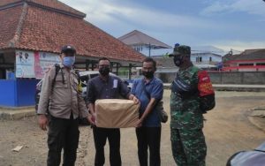 Bhabinkamtibmas Polsek Malingping Polres Lebak bersama Babinsa Pengamanan dan Pengawalan Surat Suara Pilkades