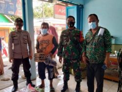 Bhabinkamtibmas Polsek Malingping Polres Lebak monitoring sekaligus pengamanan penyaluran BPNT
