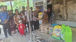POLSEK JAWILAN SALURKAN BANTUAN SEMBAKO UNTUK WARGA TIDAK MAMPU DI DESA PASIRBUYUT